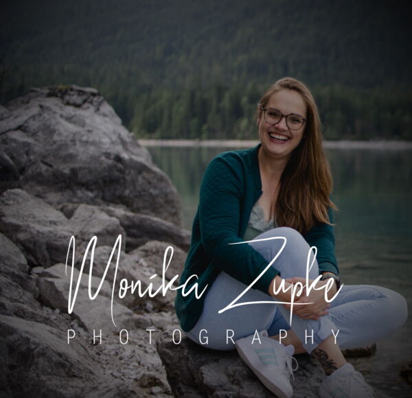 Bild eines sich küssenden Paares auf dem Land.